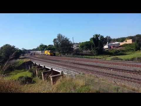 QR NATIONAL 5036/5003 at EAST MAITLAND WITH EMPTY COAL WAGONS
