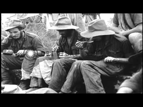 A column of British Army's 'Special Force' Chindits marches through Kamaing, Burm...HD Stock Footage