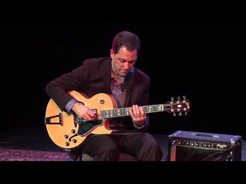 Andy Brown playing solo jazz guitar doing a Blues In G