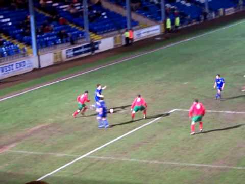 Ashley Stott ends up one-on-one with the Harrogate Railway 'keeper but blazes it over.
