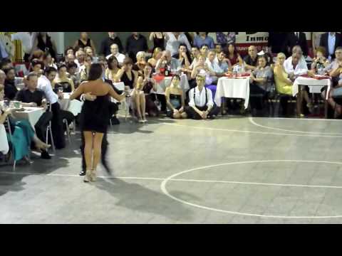  Sebastian Missé  and  Andrea Reyero  are  dancing  to  the  vals  "  Recuerdos de la Pampa  "