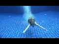 Sexy Young Girl Swimming In The Pool With Black Biniki Enjoying Underwater Swimming View