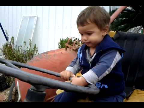 Oz driving the tractor