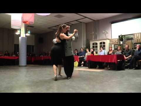  Stefania Colina  and  Juan Martin Carrara  are  dancing  to  "  A una mujer  "  by  Juan D'Arienzo