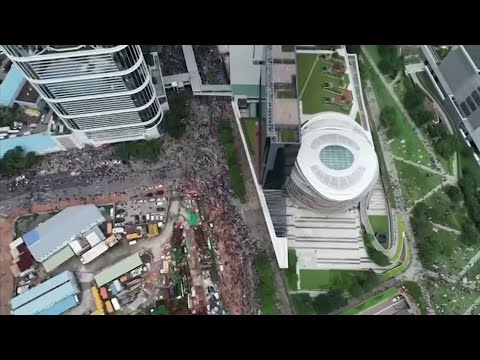 Thousands of protesters blocked entry to Hong Kong's government headquarters on Wednesday, delaying a legislative session on a proposed extradition bill that has heightened fears over greater Chinese control. (June 12)