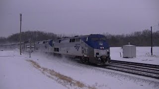 preview picture of video 'Amtrak blows through snow-covered Agency, Iowa'