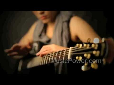 Kaki King Shows off Her Ovation Adamas 1581-KK Guitar