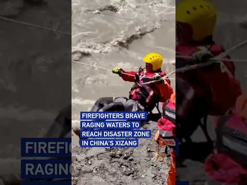 Firefighters brave raging waters to reach disaster zone in China's Xizang