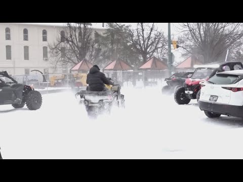 Dangerous snow-covered roads in Downtown Memphis | Winter storm coverage