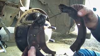How to: Rear brake replacement on my daily driver "Betty White" 1997 Dodge Intrepid.
