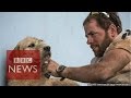 Extreme adventurers adopt plucky dog