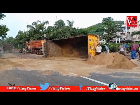 Sand lorry TurnOver at National Highway Tatichetlapalem in Visakhapatnam,Vizagvision....