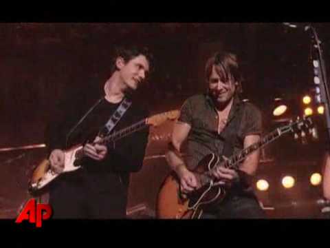 Mayer, Urban Trade Guitars for 'Crossroads'