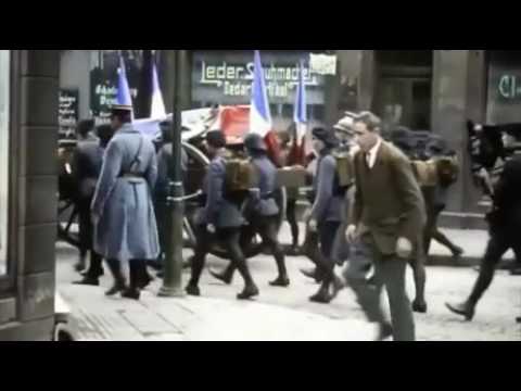 French soldier kicking German citizen in 1923 colorised