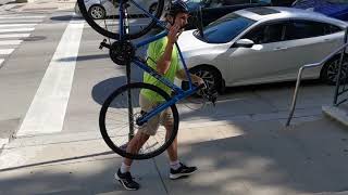 Carrying a Bike Up Stairs