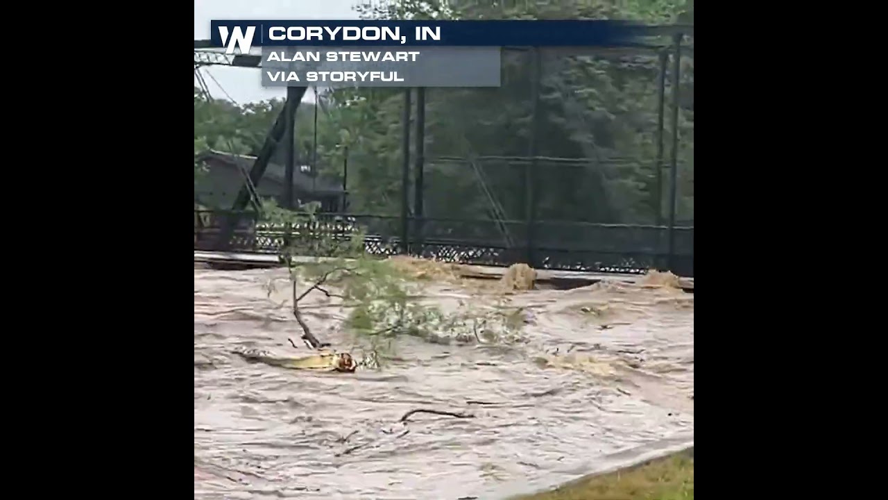 Flood waters surge through Corydon, Indiana as saturated Midwest soils reduce absorption during heavy rainfall