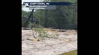 Flood waters surge through Corydon, Indiana as saturated Midwest soils reduce absorption during heavy rainfall