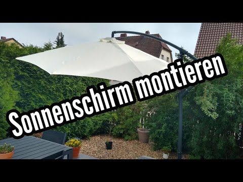 Instructions for setting up a cantilever parasol and assembling the parasol