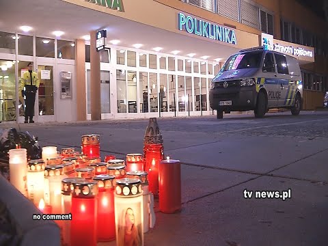 Thumbnail for Candles lit outside Czech hospital after deadly shooting by R.E.M.
