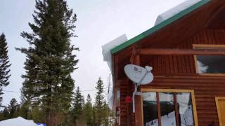 preview picture of video 'Snow Crashing Off Roof Of Our Montana Cabin'