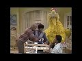 Sesame Street Big Bird Asks Susan Olivia And Gordon A Telly Question While Change A Miles Diaper