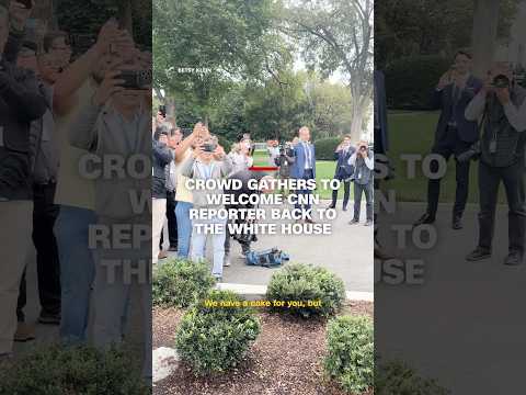 Crowd gathers to welcome CNN reporter back to the White House