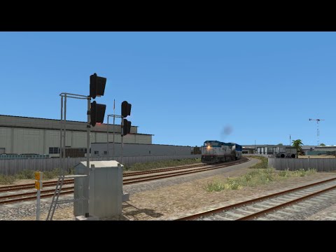 Dash 8-32BWH 509 leads Amtrak Surfliner 580 at Orange  ( TS2022 )