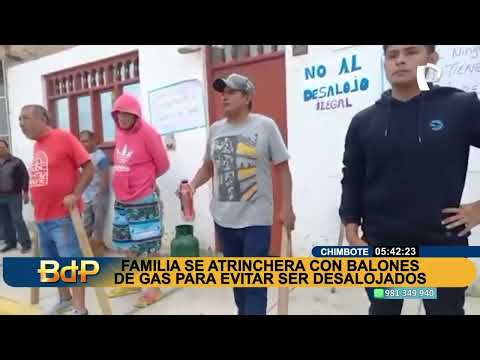 , title : 'Chimbote: familia se atrinchera con balones de gas para no ser desalojados de su casa'