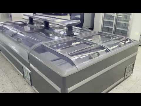 Combination island freezer suitable for displaying frozen foods, ice cream, etc