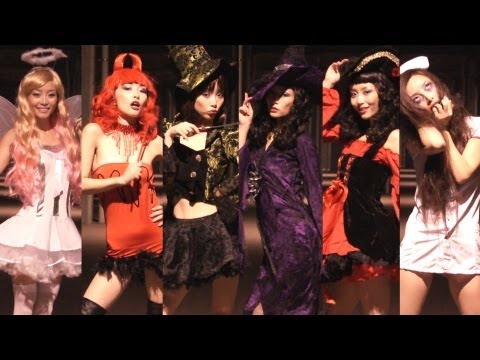 Woman Models Halloween Costumes To Our Music