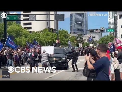 Protester detained after rushing Trump's motorcade outside Miami courthouse