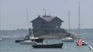 The Clingstone House sits on its own tiny island off of the Jamestown, Rhode Island shore