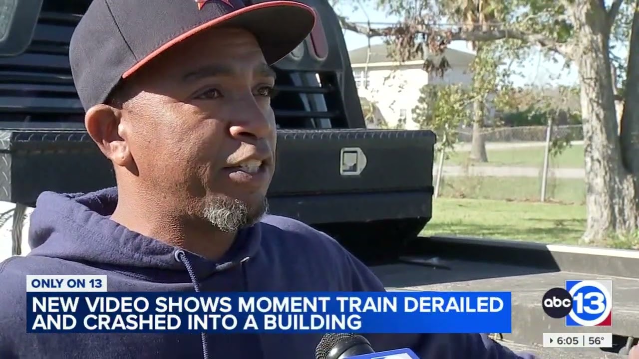 Video shows train derailing and wiping out the side of a building