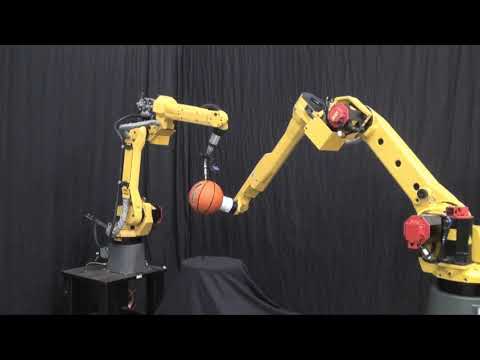 FANUC M-10i A and Arc Mate 100iC Robots Demonstrate Coordinated Motion on a Basketball