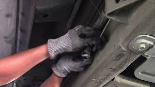 How to disconnect and reconnect parking brake cable from the brake shoe on Chevy