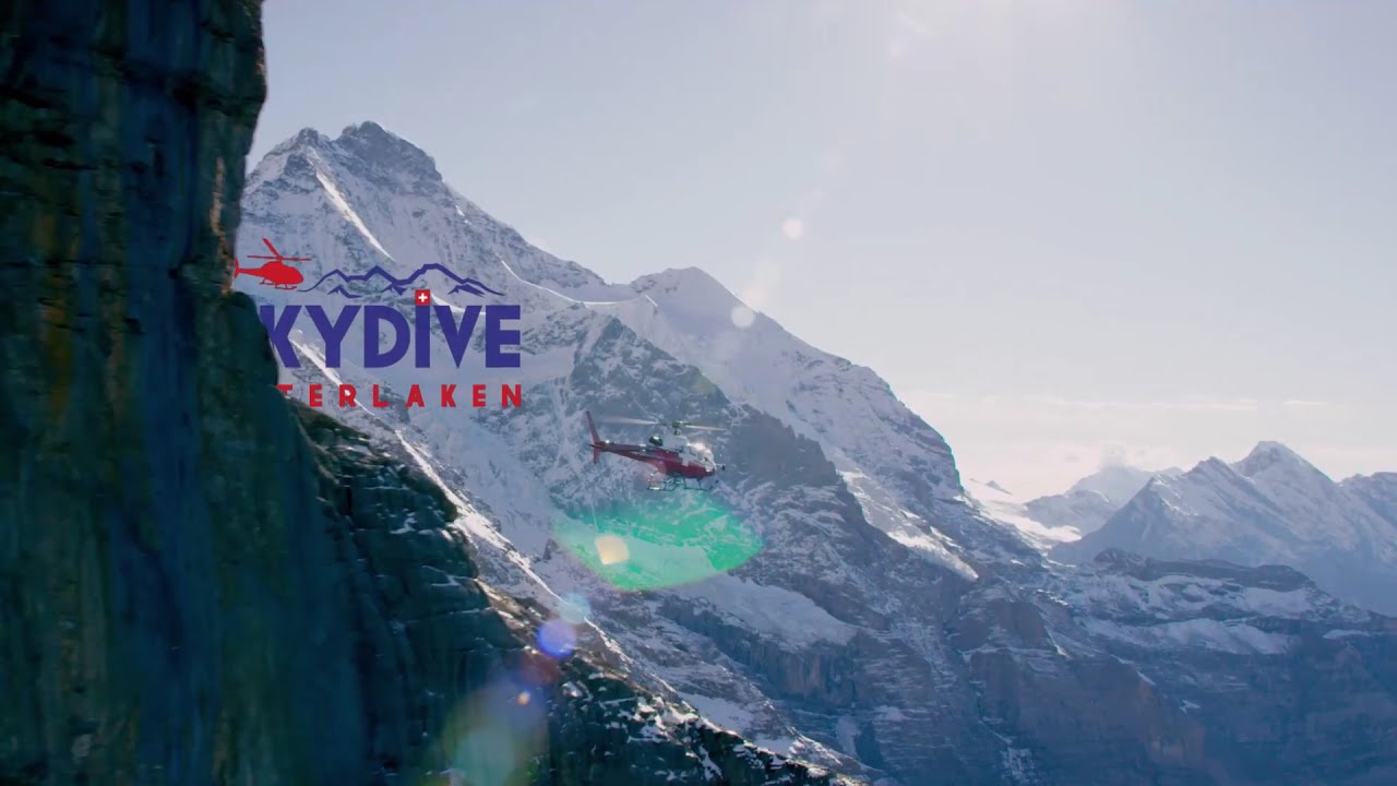 Feel the rush of skydiving over the picturesque Alpine valley.