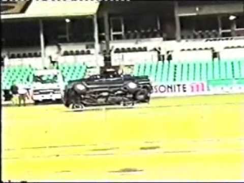 Ian Soanes driving a car on its 2 side wheels
