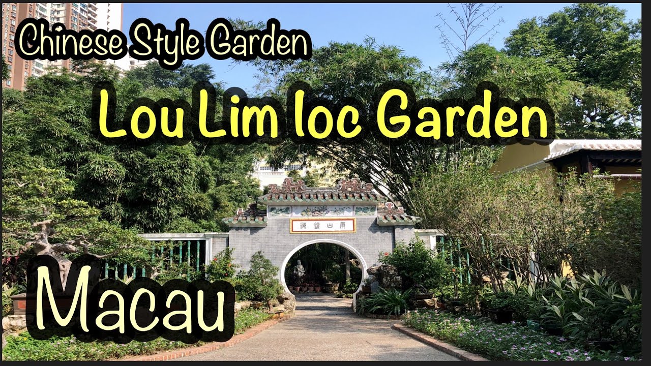 Discover the traditional Chinese garden architecture surrounded by lush greenery.