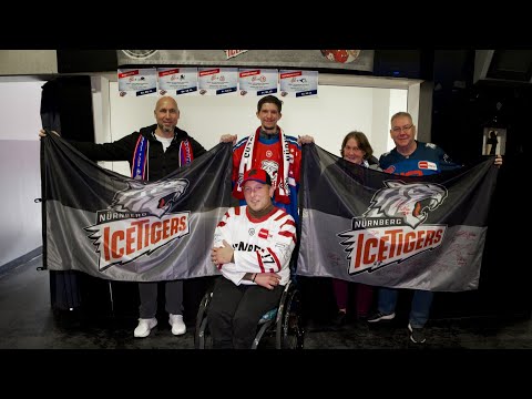 Nürnberg Ice Tigers und Dorian Wilden versteigern Fahnen zugunsten Hilfsbedürftiger