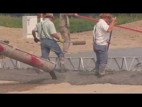 Amish pouring concrete