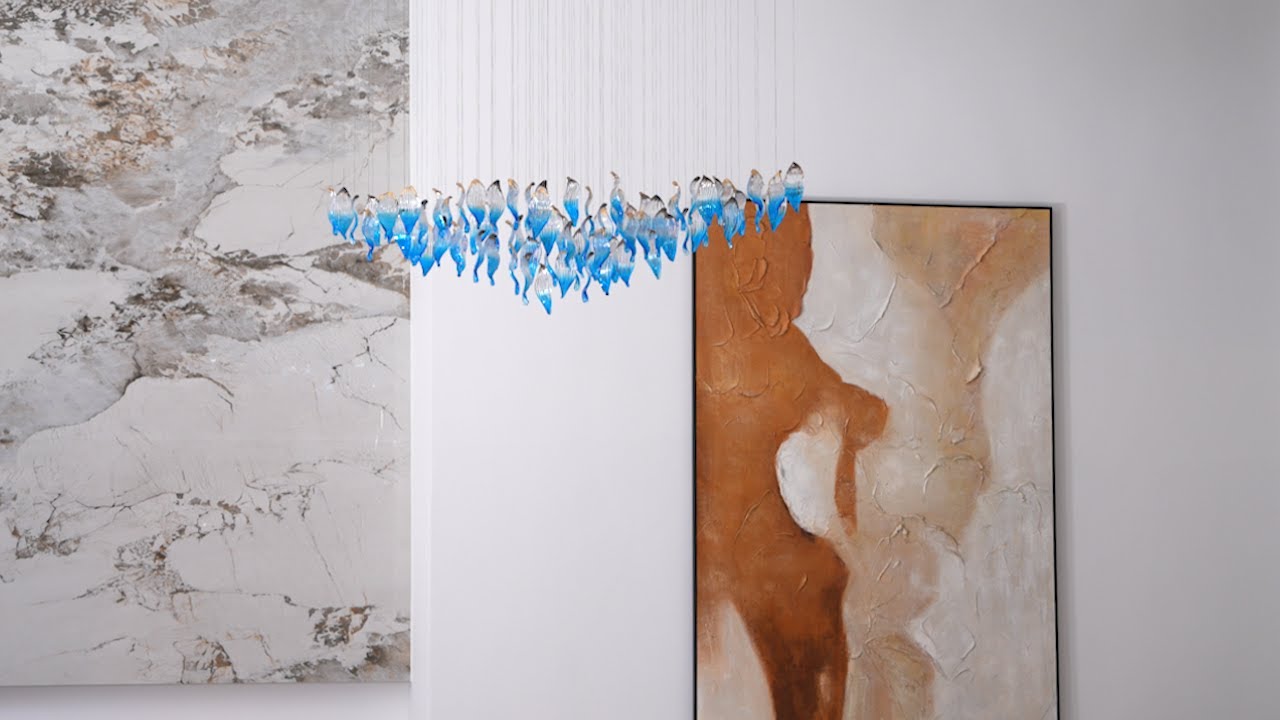 Custom glass branch chandelier — click to play