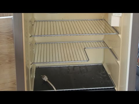 Removal of original Dometic refrigerator.