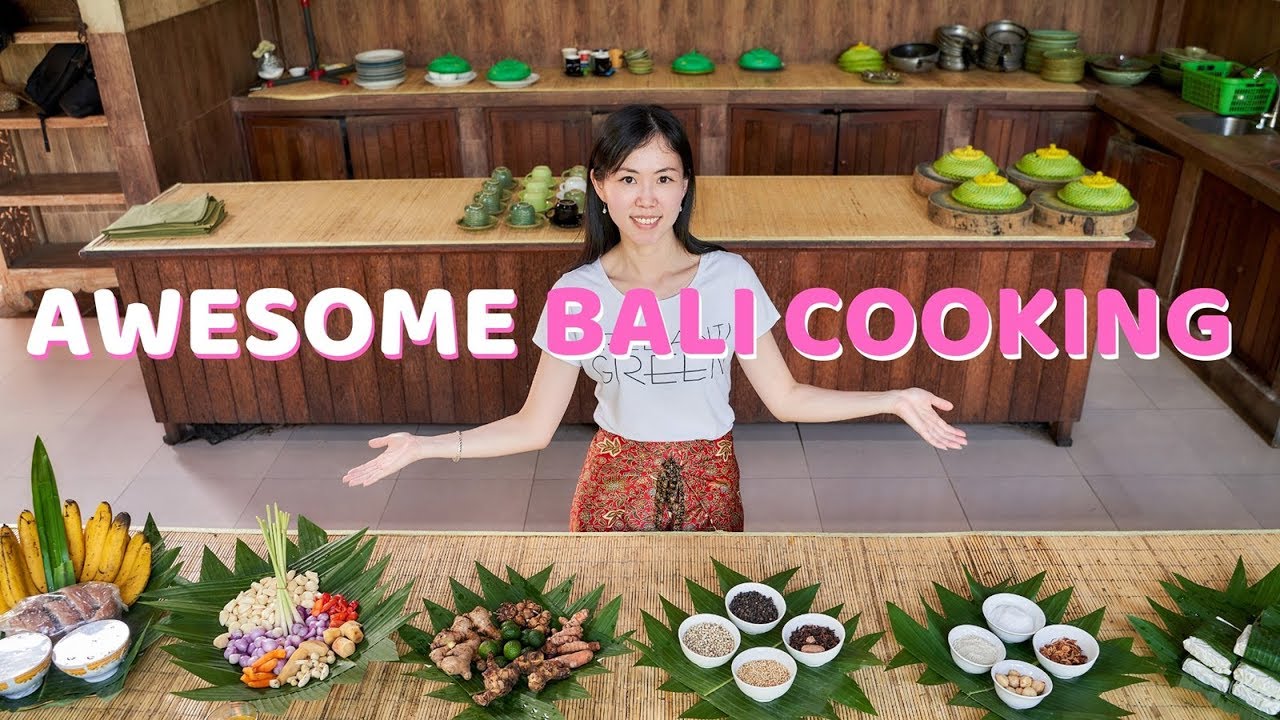 A tourist indulges in a captivating cooking class at the exotic Paon Bali.