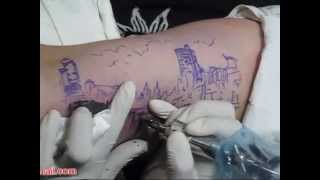 preview picture of video 'PARADISE INK TATTOO BALI - Melbourne city scape.mpg'