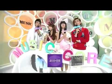 Onew and Minho presenters on Music Bank