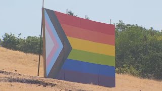 Newberg farm owner constructs giant pride flag following ban by school board
