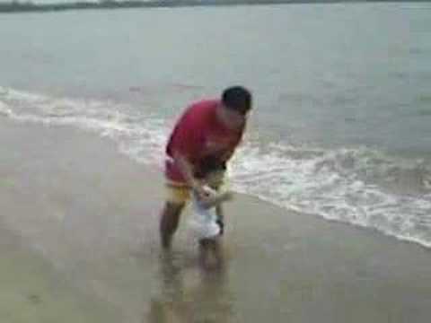 Ashraf playing at the beach
