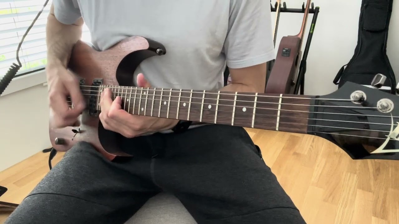 Guitar playing the lead solo from Status Quo's Rockin' All Over the World