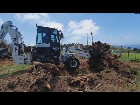 37X Mini TLB Removing Lifting A Large Tree Stump & Roots