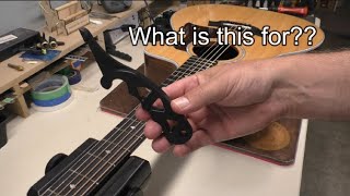 What is this tool? A String Stretcher, of course...